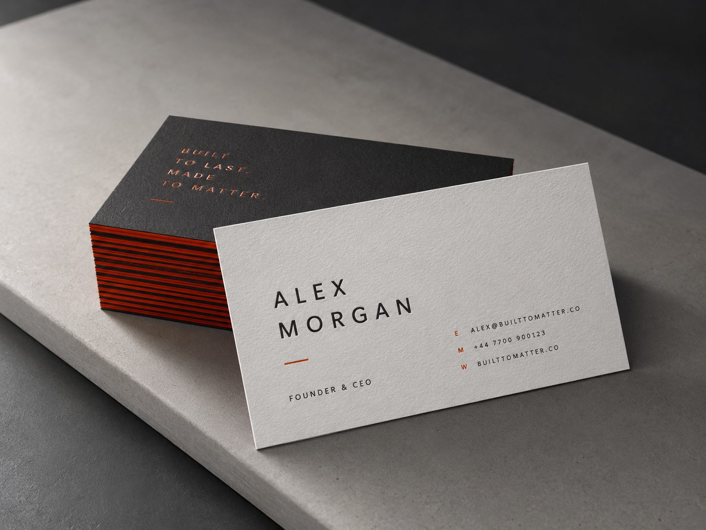 Modern founder business cards with painted red edges